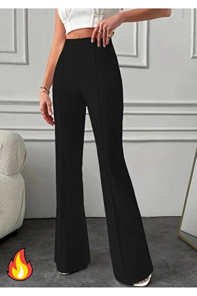 Black High Waist Flared Pants with Front Seam, model in white crop top