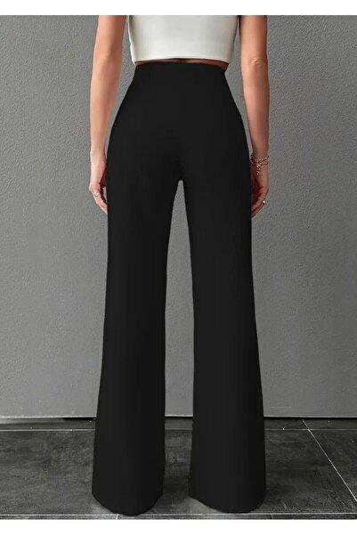Black High Waist Flared Pants with Front Seam, model in white crop top