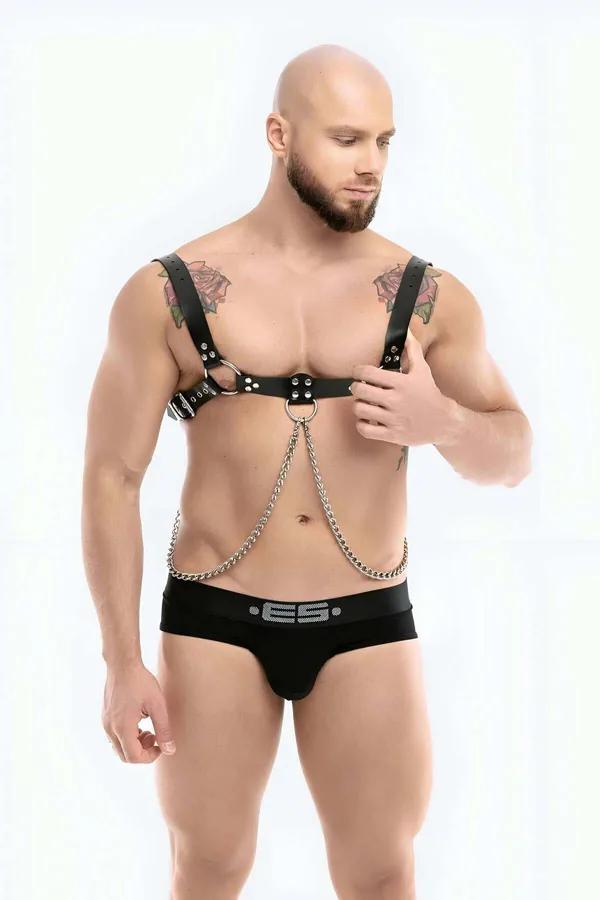 Model wearing black Men's Adjustable Vegan Leather Chest Harness with chrome-plated steel chains and silver alloy hardware front view