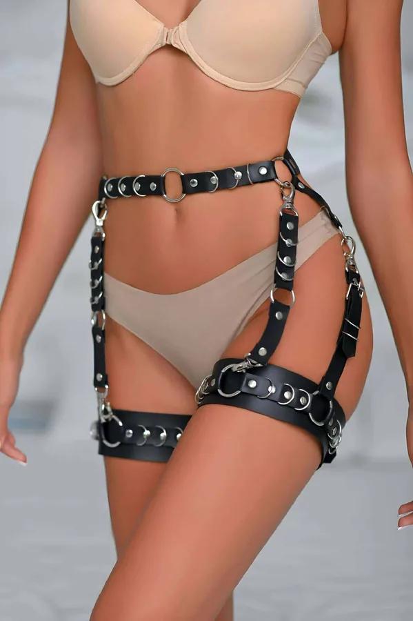 Black faux leather waist and thigh garter harness with silver O-rings, dome rivets, and lobster-claw clasps on adjustable str