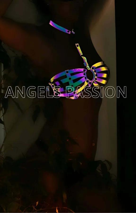 Iridescent holographic caged chest harness top with riveted O-ring center in purple, blue, and gold shifting faux leather