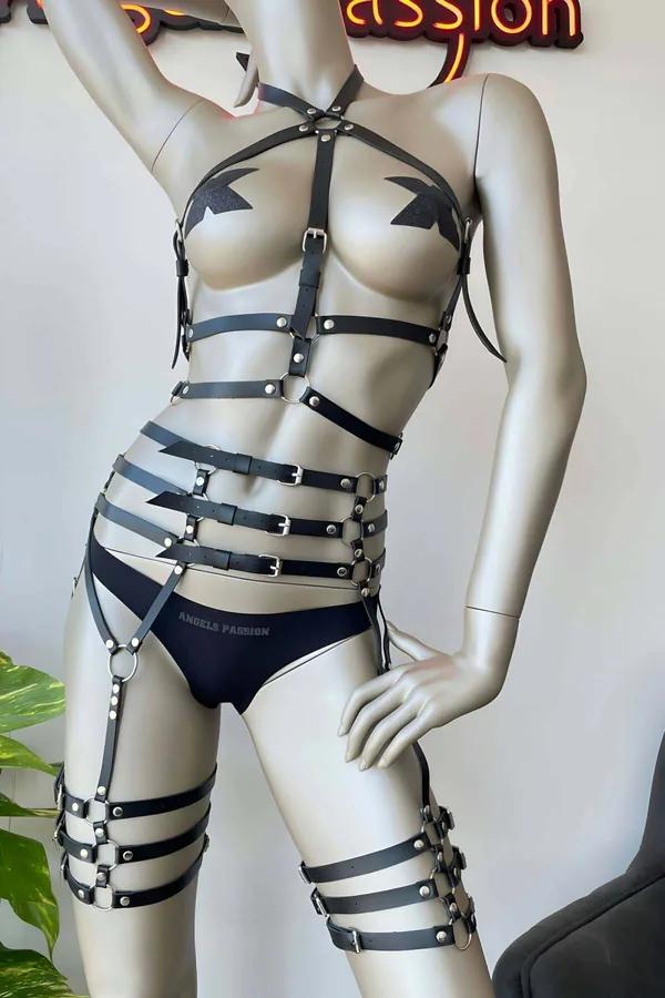 black faux leather full body harness with four-band waist cage and dual thigh garter straps silver O-ring hardware