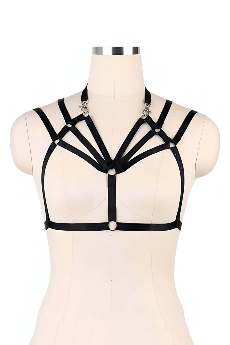 Side view of adjustable vegan leather harness straps with O-ring detail