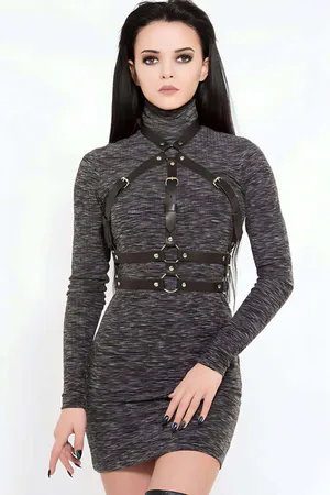 Black faux leather body harness with adjustable straps and O-ring detail