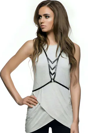 Black faux leather chest harness with studded wave detail