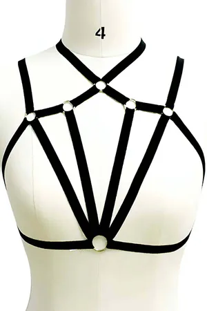 Black adjustable strappy chest harness with silver O-rings