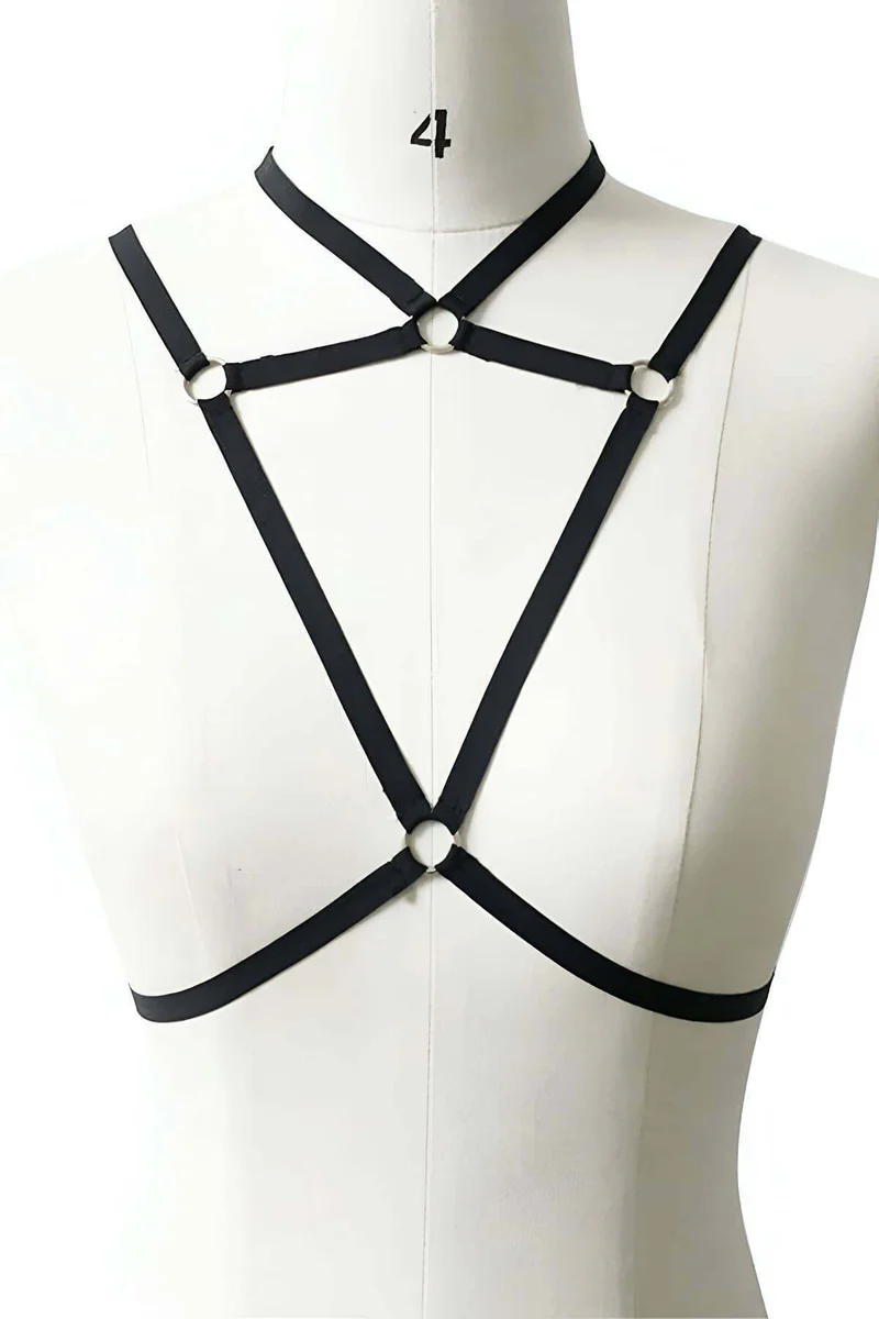 Close-up of black choker harness neck strap and O-ring detail