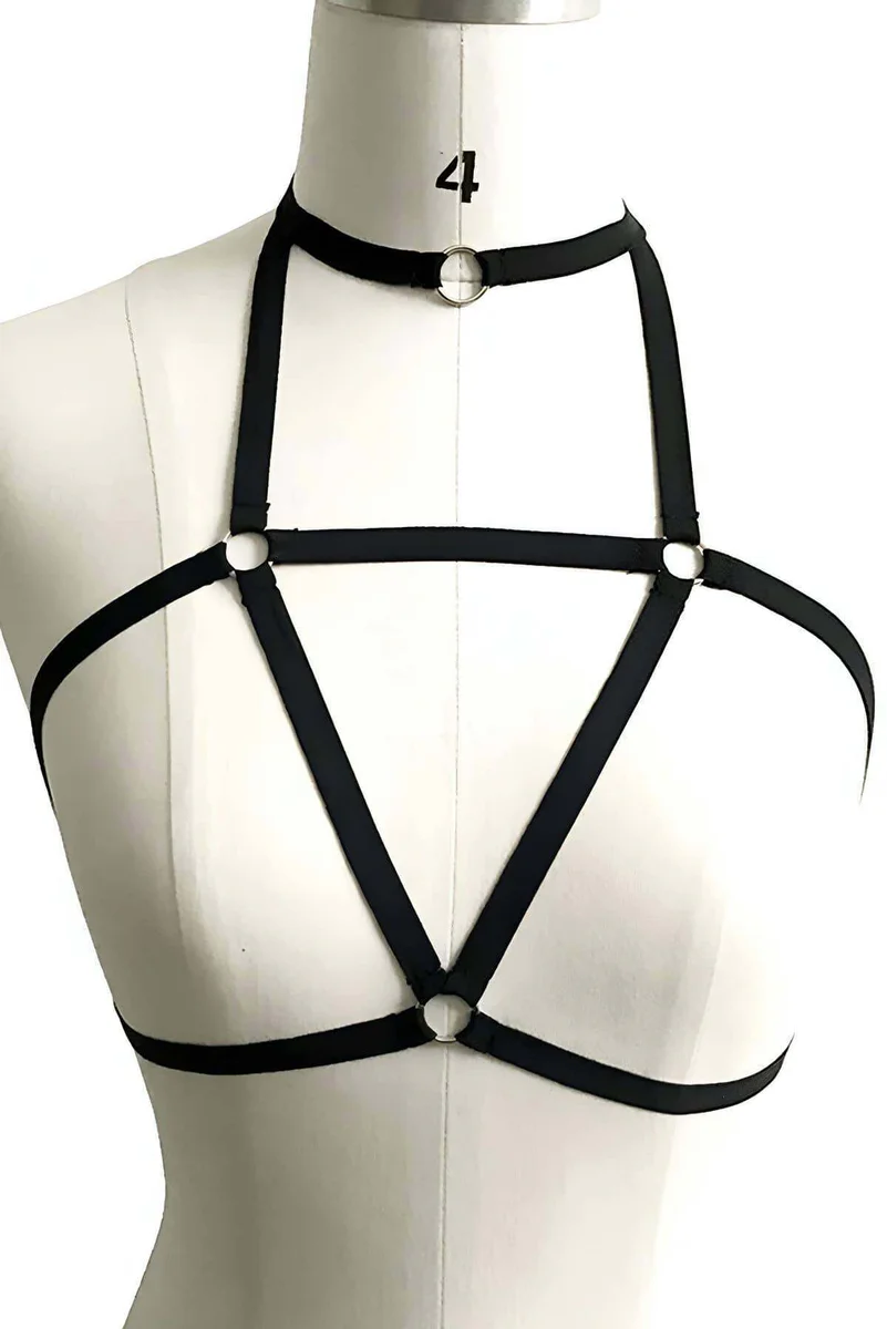 Side view of black fashion harness showing strap configuration and O-ring choker detail