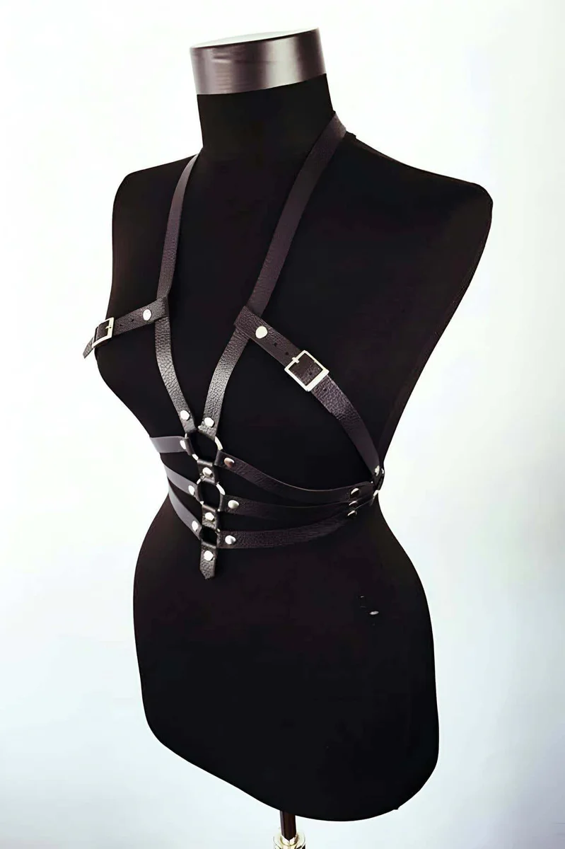 Black faux leather strappy body harness front view with O-rings