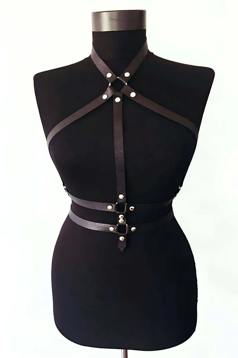 Side view of black faux leather body harness on mannequin with O-ring accent