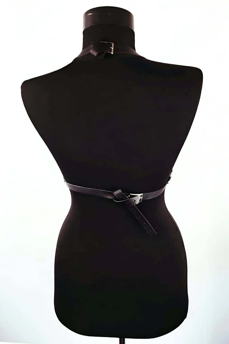 Black vegan leather chest harness back view with adjustable straps and buckle.