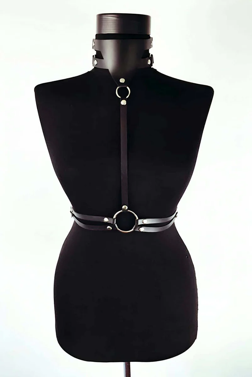 Adjustable waist belt on faux leather body harness with O-ring and collar detail