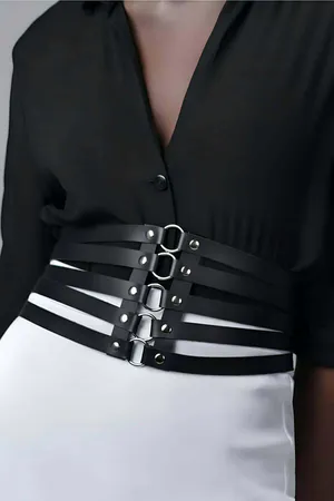 Black faux leather strappy waist harness with silver O-ring details