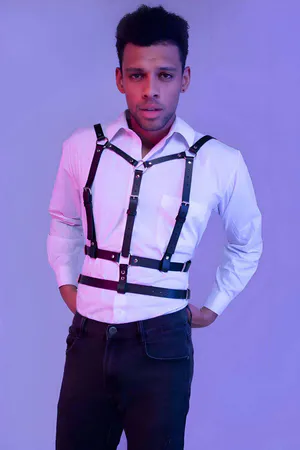 Black Faux Leather Chest Harness with Silver O-Rings worn over white shirt