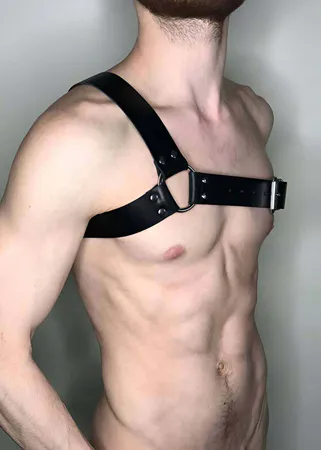 Black Faux Leather Asymmetric Chest Harness with Silver O-Ring on Model