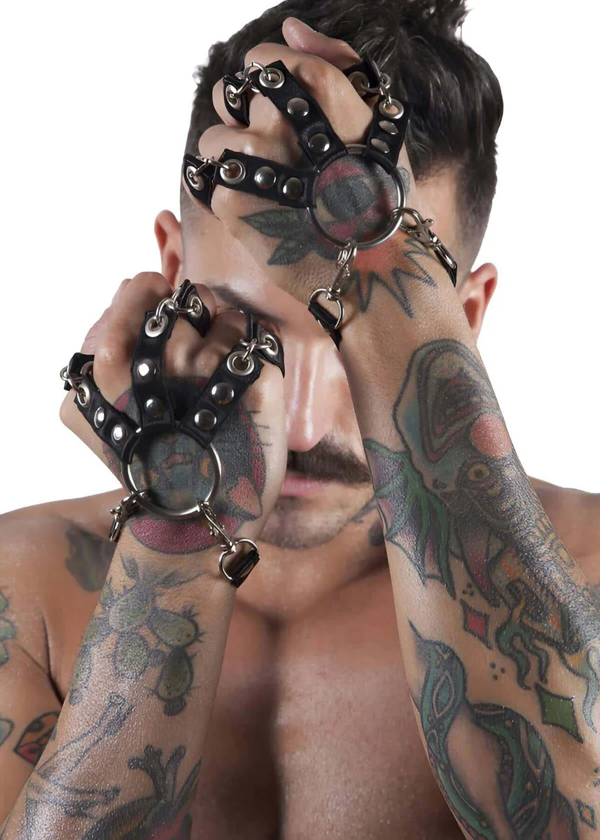 Black faux leather hand harness with O-ring and heart charm