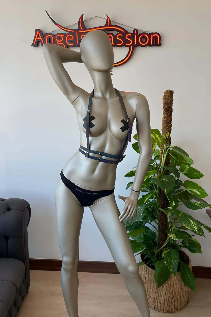 Festival Harness Outfit Flat Lay with Black Shorts and Glowing Straps
