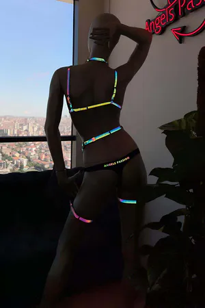 Iridescent full body harness with strappy garter showing rainbow reflective effect