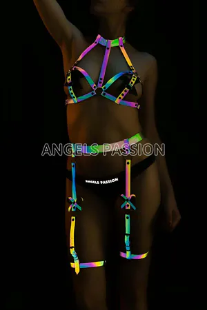 Rainbow reflective full body harness and garter set worn by a model