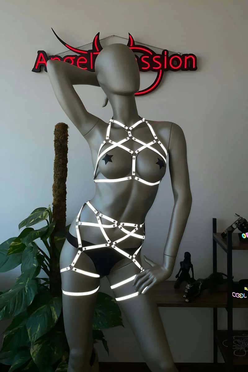 Reflective white festival lingerie set with star pasties and thigh straps