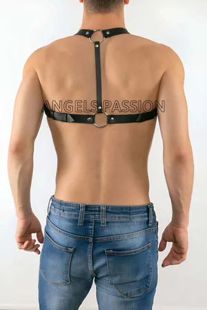 Black faux leather chest harness with adjustable straps and central O-ring