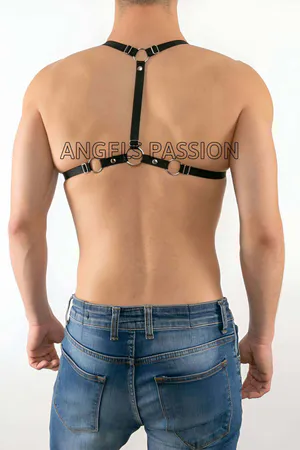 Black vegan leather laced cage body harness with silver O-rings and adjustable straps