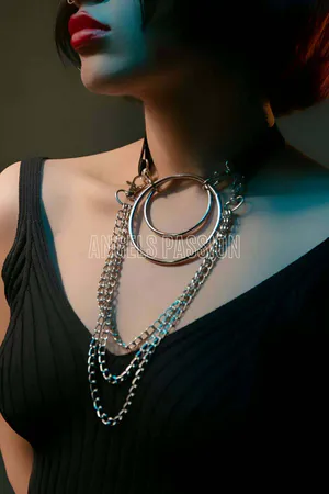 Black Layered O-Ring Harness Choker with multiple silver chains on model
