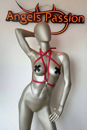 Red faux leather strappy body harness with silver chain detail