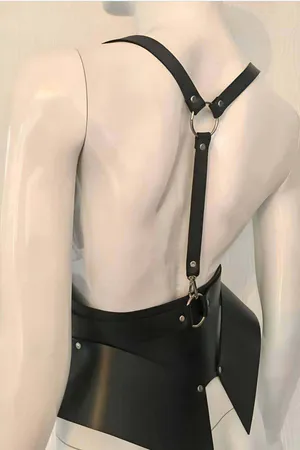 Black asymmetrical faux leather body harness with O-ring and chain detail