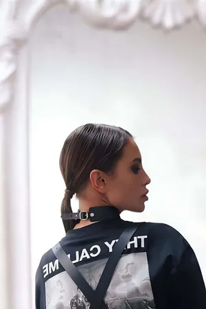 Black faux leather lace-up choker with silver eyelets