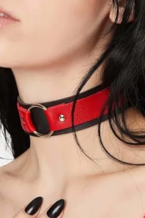 Red Faux Leather Choker with Black Trim and Silver O-Ring Closure Worn by Woman