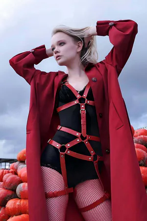 Red faux leather full body harness with adjustable straps and silver O-rings
