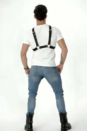 Black faux leather adjustable suspender harness with silver metal clips and buckles
