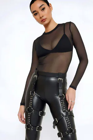 Black Faux Leather Studded Thigh Harness with O-Rings, worn over leggings