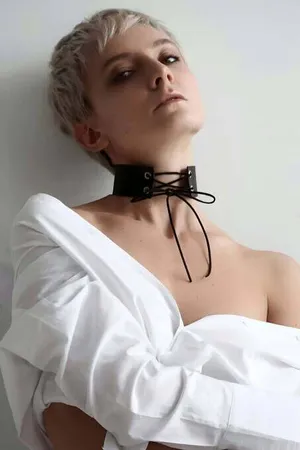 Black Lace-Up Faux Leather Choker Collar with Rope Tie on a person