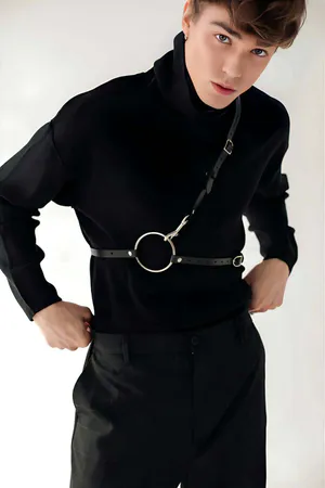 Black faux leather body harness with adjustable strap and O-ring