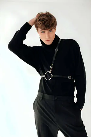 Black faux leather body harness with adjustable strap and O-ring