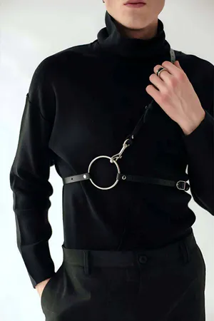 Black faux leather body harness with adjustable strap and O-ring
