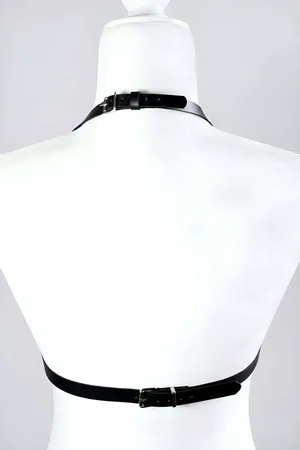 Black faux leather bra harness with molded cups and silver buckle closure