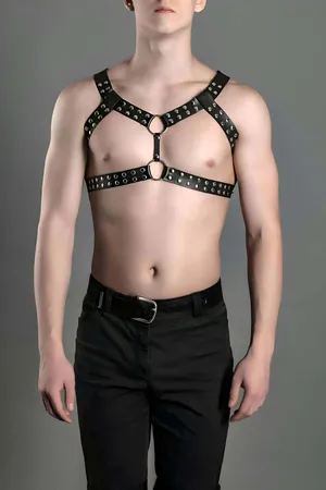 Black faux leather studded chest harness with silver O-rings
