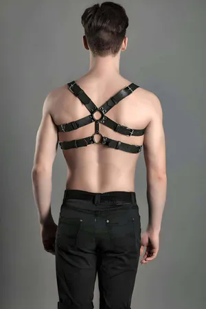Black faux leather studded chest harness with silver O-rings
