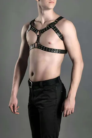 Black faux leather studded chest harness with silver O-rings