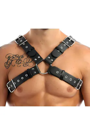 Black faux leather chest harness with adjustable straps and O-ring detail