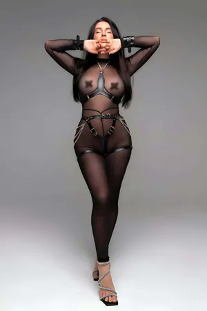 Black faux leather full body harness set with chest harness, hip chains and wrist cuffs