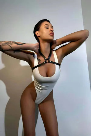 Black vegan leather halterneck chest harness with O-ring detail