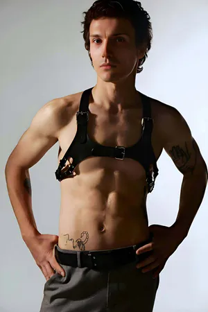 Black faux leather adjustable chest harness with metal buckles