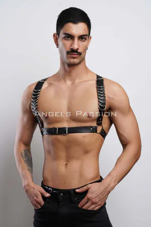 Black faux leather chest harness with silver rings and adjustable straps