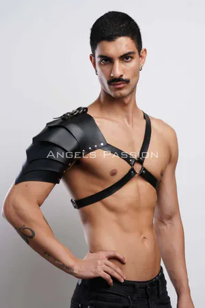 Black faux leather shoulder harness with layered armor design and adjustable chest straps