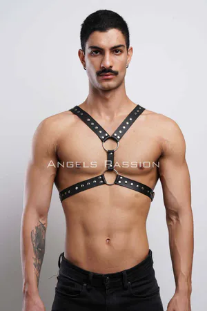 Black faux leather studded chest harness with O-ring details