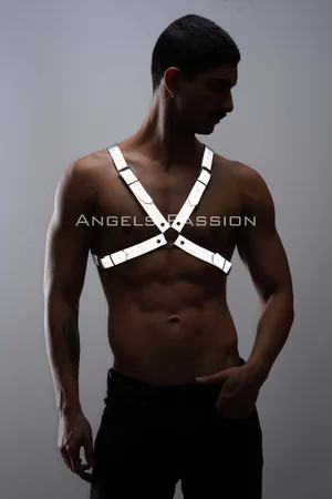 Reflective chest harness with adjustable straps worn by a man